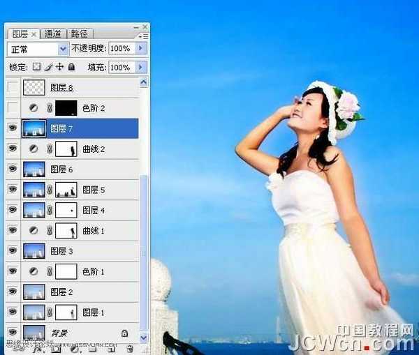 Photoshop调出海景人物图片纯美的蓝色调